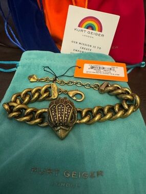 Kurt Geiger Antique Gold Tone Chunky Chain Bracelet with Crystal Shield Charm